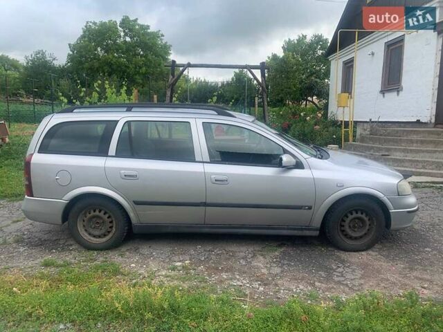 Серый Опель Астра, объемом двигателя 1.6 л и пробегом 242 тыс. км за 3800 $, фото 1 на Automoto.ua