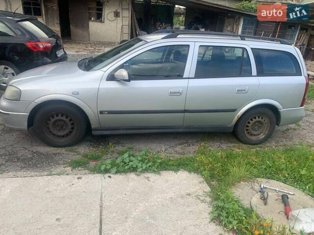 Серый Опель Астра, объемом двигателя 1.6 л и пробегом 242 тыс. км за 3800 $, фото 2 на Automoto.ua