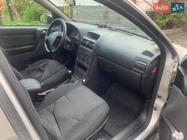 Серый Опель Астра, объемом двигателя 1.6 л и пробегом 242 тыс. км за 3800 $, фото 7 на Automoto.ua