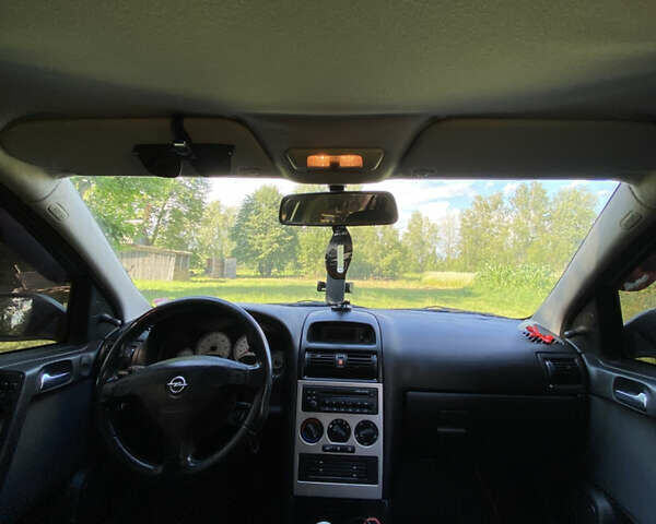 Серый Опель Астра, объемом двигателя 2 л и пробегом 223 тыс. км за 3500 $, фото 13 на Automoto.ua