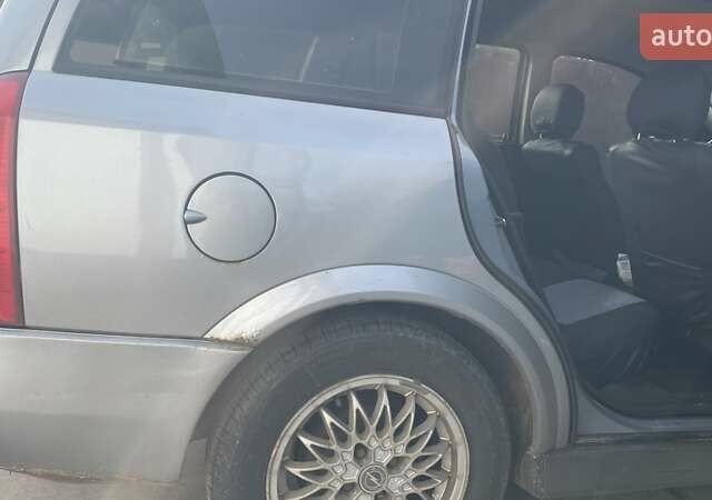 Серый Опель Астра, объемом двигателя 1.6 л и пробегом 190 тыс. км за 3400 $, фото 6 на Automoto.ua