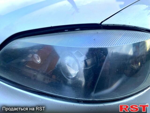 Сірий Опель Астра, об'ємом двигуна 2 л та пробігом 425 тис. км за 2997 $, фото 4 на Automoto.ua