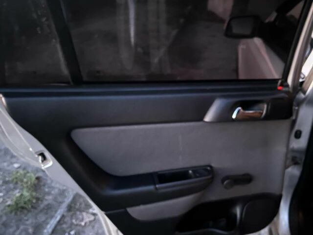 Серый Опель Астра, объемом двигателя 1.6 л и пробегом 175 тыс. км за 3400 $, фото 12 на Automoto.ua