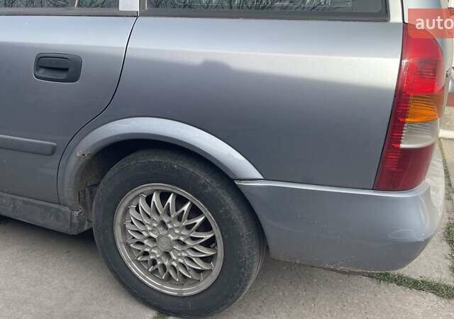 Серый Опель Астра, объемом двигателя 1.6 л и пробегом 190 тыс. км за 3400 $, фото 8 на Automoto.ua