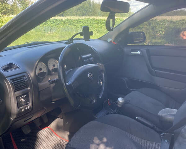 Серый Опель Астра, объемом двигателя 2 л и пробегом 223 тыс. км за 3500 $, фото 9 на Automoto.ua