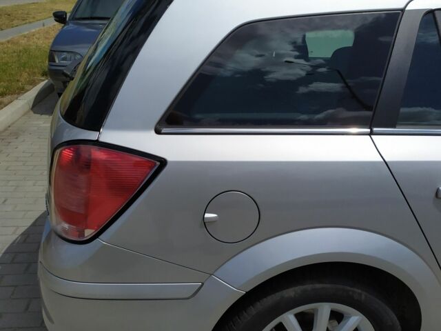 Серый Опель Астра, объемом двигателя 1.6 л и пробегом 220 тыс. км за 4500 $, фото 10 на Automoto.ua