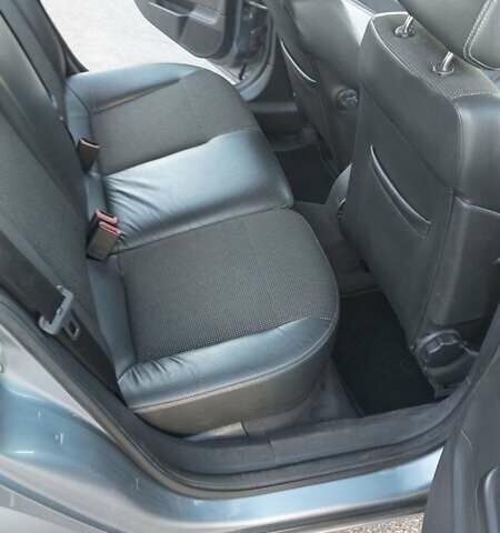 Серый Опель Астра, объемом двигателя 1.6 л и пробегом 232 тыс. км за 4700 $, фото 4 на Automoto.ua