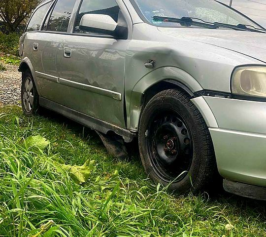 Серый Опель Астра, объемом двигателя 1.6 л и пробегом 290 тыс. км за 1200 $, фото 5 на Automoto.ua