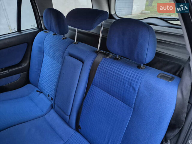 Серый Опель Астра, объемом двигателя 2 л и пробегом 333 тыс. км за 3450 $, фото 9 на Automoto.ua