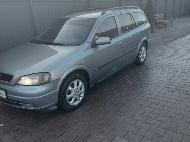 Серый Опель Астра, объемом двигателя 2 л и пробегом 300 тыс. км за 4500 $, фото 3 на Automoto.ua