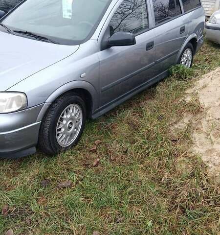 Серый Опель Астра, объемом двигателя 1.6 л и пробегом 250 тыс. км за 3600 $, фото 1 на Automoto.ua