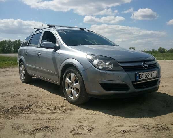 Серый Опель Астра, объемом двигателя 1.6 л и пробегом 257 тыс. км за 5000 $, фото 11 на Automoto.ua