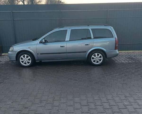 Серый Опель Астра, объемом двигателя 2 л и пробегом 300 тыс. км за 4500 $, фото 13 на Automoto.ua