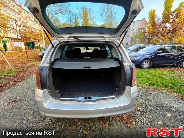 Серый Опель Астра, объемом двигателя 1.7 л и пробегом 260 тыс. км за 4950 $, фото 6 на Automoto.ua