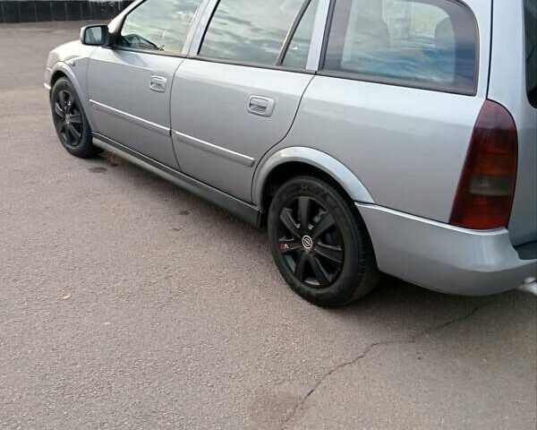 Серый Опель Астра, объемом двигателя 2 л и пробегом 332 тыс. км за 3500 $, фото 2 на Automoto.ua