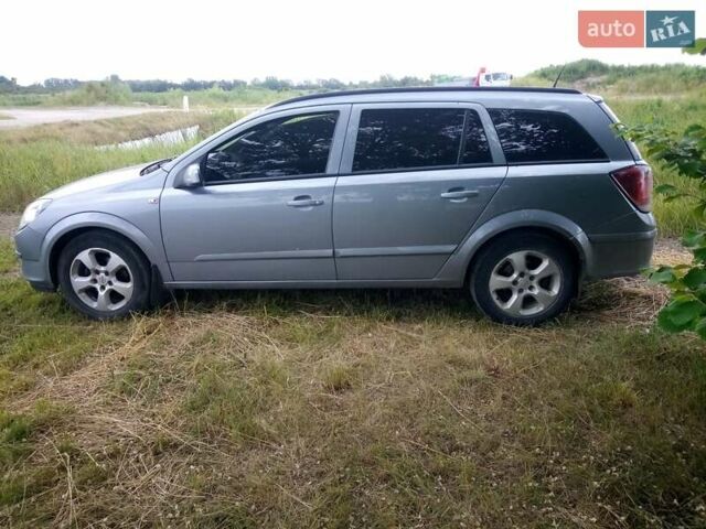 Серый Опель Астра, объемом двигателя 1.6 л и пробегом 257 тыс. км за 5000 $, фото 7 на Automoto.ua