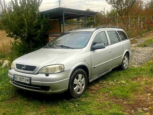 Серый Опель Астра, объемом двигателя 1.6 л и пробегом 290 тыс. км за 1200 $, фото 1 на Automoto.ua