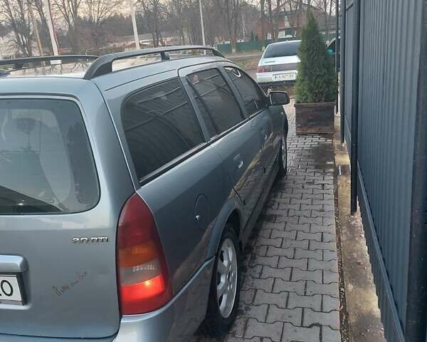 Серый Опель Астра, объемом двигателя 2 л и пробегом 300 тыс. км за 4500 $, фото 3 на Automoto.ua