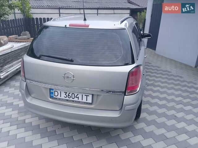 Серый Опель Астра, объемом двигателя 1.6 л и пробегом 216 тыс. км за 2700 $, фото 8 на Automoto.ua