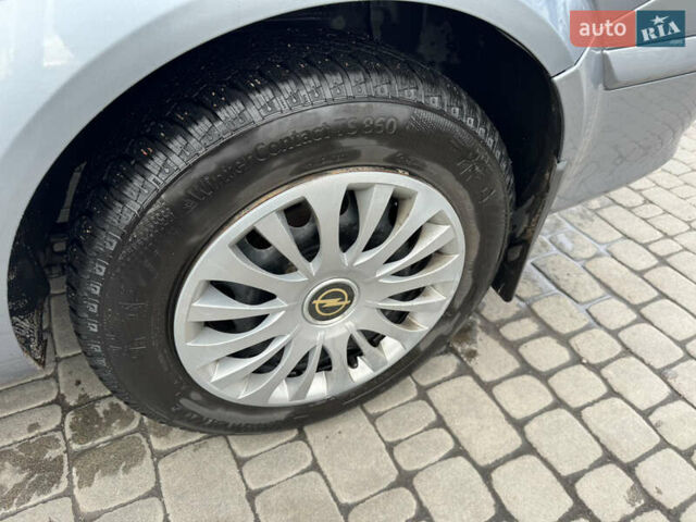 Серый Опель Астра, объемом двигателя 1.6 л и пробегом 250 тыс. км за 4600 $, фото 31 на Automoto.ua