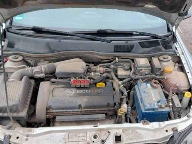 Серый Опель Астра, объемом двигателя 1.6 л и пробегом 296 тыс. км за 2486 $, фото 6 на Automoto.ua