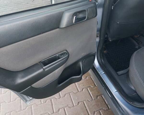 Серый Опель Астра, объемом двигателя 2 л и пробегом 300 тыс. км за 4500 $, фото 8 на Automoto.ua