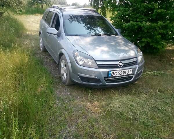 Серый Опель Астра, объемом двигателя 1.6 л и пробегом 257 тыс. км за 5000 $, фото 9 на Automoto.ua