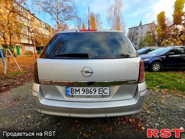 Серый Опель Астра, объемом двигателя 1.7 л и пробегом 260 тыс. км за 4950 $, фото 4 на Automoto.ua