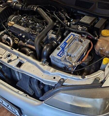 Серый Опель Астра, объемом двигателя 1.69 л и пробегом 310 тыс. км за 3100 $, фото 7 на Automoto.ua