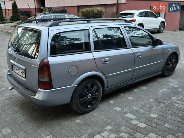 Серый Опель Астра, объемом двигателя 2 л и пробегом 333 тыс. км за 3450 $, фото 4 на Automoto.ua