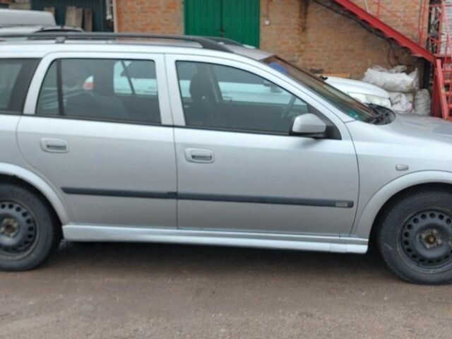 Серый Опель Астра, объемом двигателя 1.6 л и пробегом 296 тыс. км за 2486 $, фото 2 на Automoto.ua