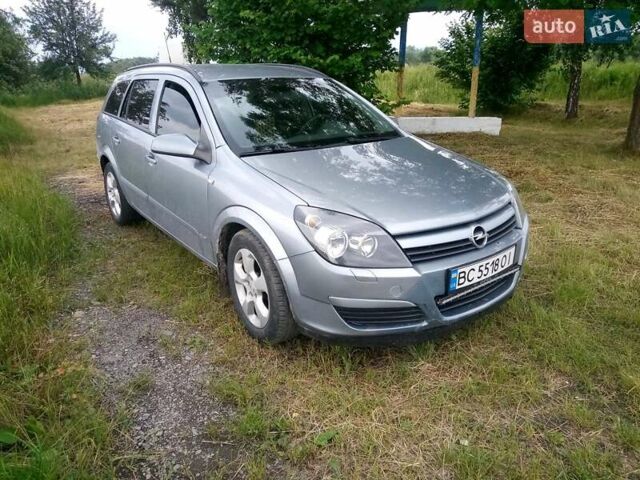 Серый Опель Астра, объемом двигателя 1.6 л и пробегом 257 тыс. км за 5000 $, фото 6 на Automoto.ua