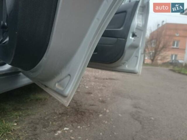 Серый Опель Астра, объемом двигателя 1.6 л и пробегом 200 тыс. км за 2500 $, фото 11 на Automoto.ua