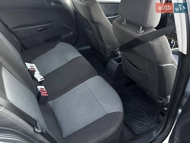 Серый Опель Астра, объемом двигателя 1.6 л и пробегом 251 тыс. км за 4750 $, фото 16 на Automoto.ua