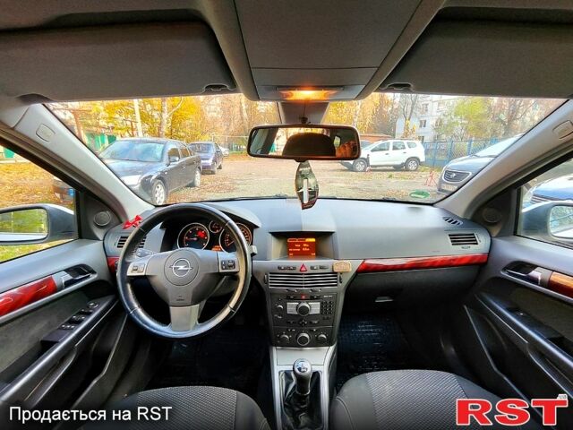 Серый Опель Астра, объемом двигателя 1.7 л и пробегом 260 тыс. км за 4950 $, фото 7 на Automoto.ua