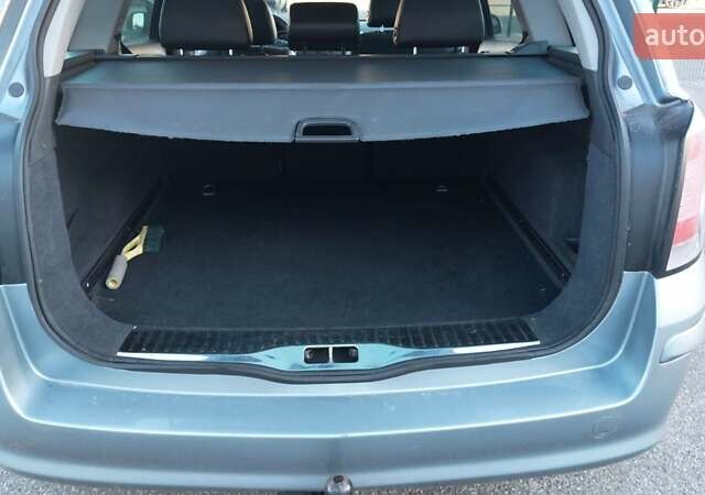 Серый Опель Астра, объемом двигателя 1.6 л и пробегом 232 тыс. км за 4700 $, фото 12 на Automoto.ua