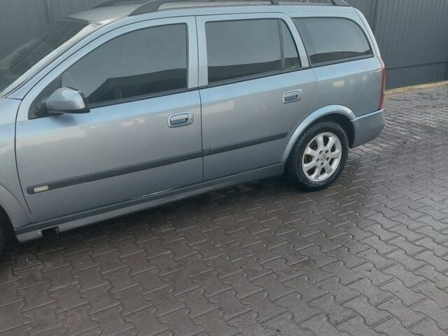 Серый Опель Астра, объемом двигателя 2 л и пробегом 300 тыс. км за 4500 $, фото 4 на Automoto.ua