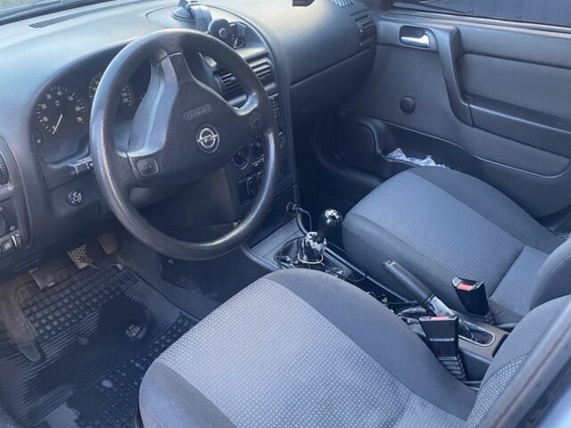 Серый Опель Астра, объемом двигателя 1.6 л и пробегом 272 тыс. км за 4100 $, фото 5 на Automoto.ua