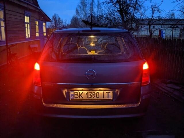 Серый Опель Астра, объемом двигателя 1.6 л и пробегом 345 тыс. км за 4250 $, фото 6 на Automoto.ua