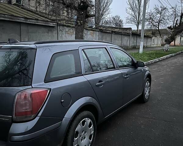 Серый Опель Астра, объемом двигателя 1.6 л и пробегом 320 тыс. км за 4750 $, фото 2 на Automoto.ua