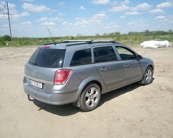 Серый Опель Астра, объемом двигателя 1.6 л и пробегом 257 тыс. км за 5000 $, фото 10 на Automoto.ua