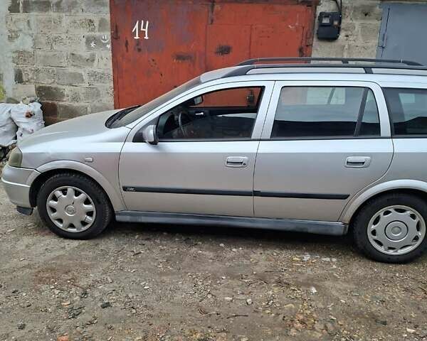 Серый Опель Астра, объемом двигателя 1.69 л и пробегом 310 тыс. км за 3100 $, фото 2 на Automoto.ua