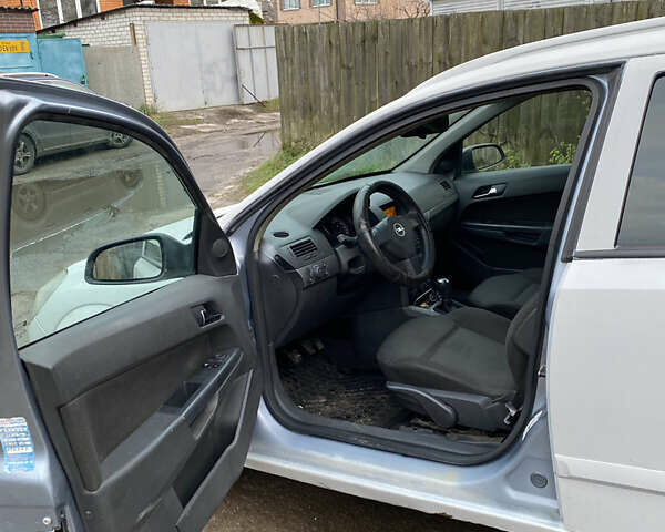 Серый Опель Астра, объемом двигателя 1.4 л и пробегом 410 тыс. км за 3700 $, фото 7 на Automoto.ua