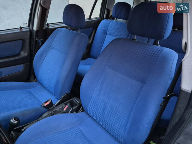 Серый Опель Астра, объемом двигателя 2 л и пробегом 333 тыс. км за 3450 $, фото 8 на Automoto.ua