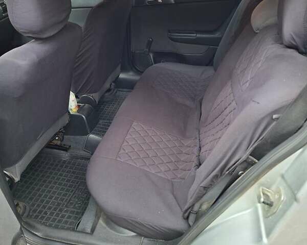 Серый Опель Астра, объемом двигателя 1.69 л и пробегом 310 тыс. км за 3100 $, фото 4 на Automoto.ua