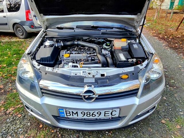 Серый Опель Астра, объемом двигателя 1.7 л и пробегом 260 тыс. км за 4950 $, фото 12 на Automoto.ua