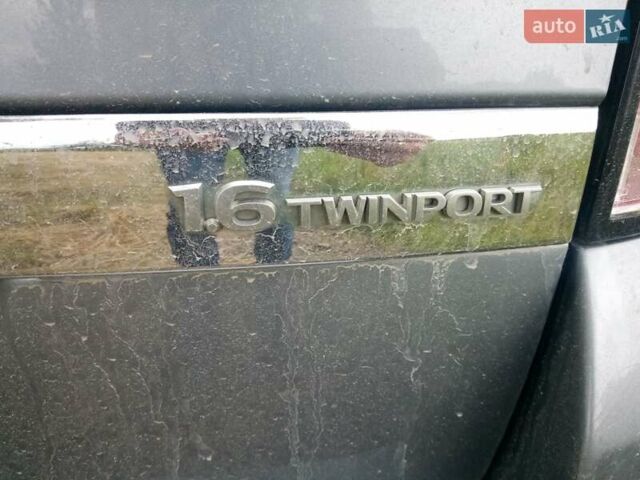 Серый Опель Астра, объемом двигателя 1.6 л и пробегом 257 тыс. км за 5000 $, фото 4 на Automoto.ua