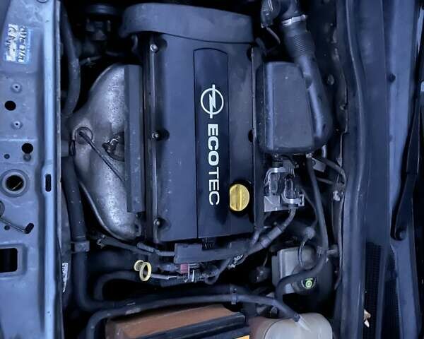 Серый Опель Астра, объемом двигателя 1.6 л и пробегом 320 тыс. км за 4750 $, фото 8 на Automoto.ua