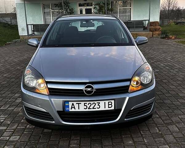 Серый Опель Астра, объемом двигателя 1.6 л и пробегом 251 тыс. км за 4750 $, фото 7 на Automoto.ua