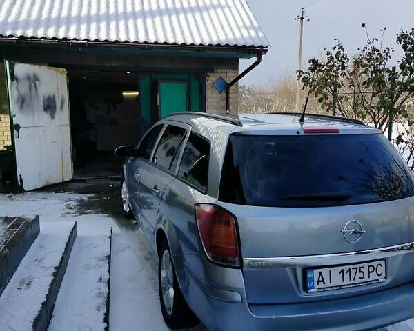 Серый Опель Астра, объемом двигателя 1.6 л и пробегом 209 тыс. км за 4400 $, фото 19 на Automoto.ua